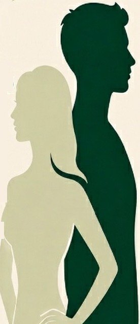 Silhouettes of a woman and a man standing back to back